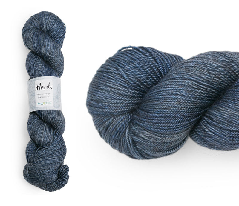 Hand-dyed, 20% yak / 20% silk / 60% superwash merino yarn. Colourway: Double Denim. 4ply, 100g skeins/approx 365m. A luxurious yarn spun from exotic fibres. This yarn is silky and drapey so it works very well for shawls but can also be used for that special garment.