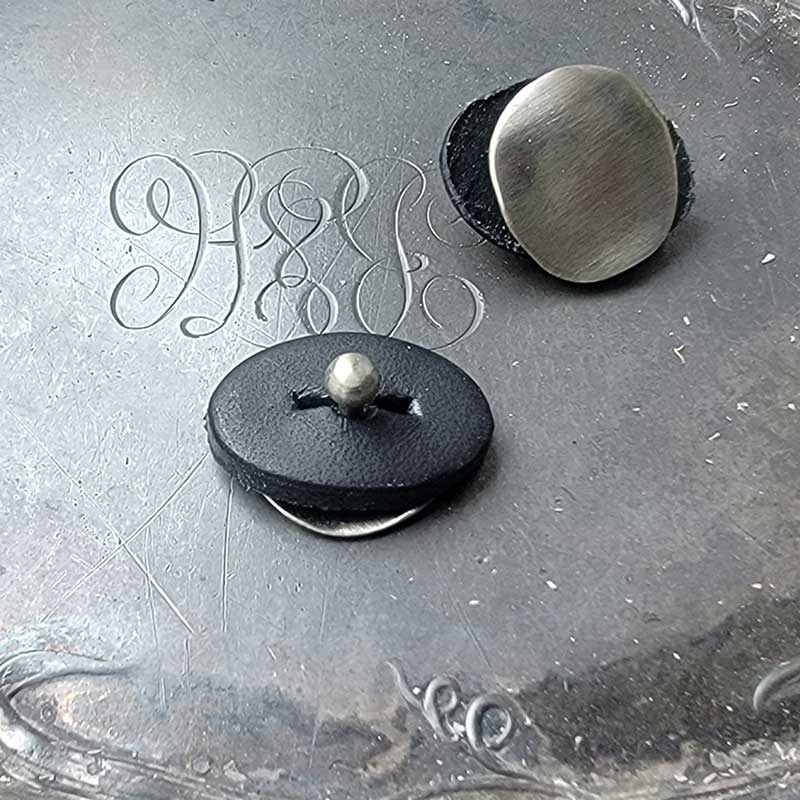 Midcentury Modern Circle Stud Pedestal Button by JUL Designs White brass with leather backing Available in white brass and blacked white brass Ornament size - 25mm (1") Shaft length - 9.5mm (3/8") Leather backing - 22mm (7/8")