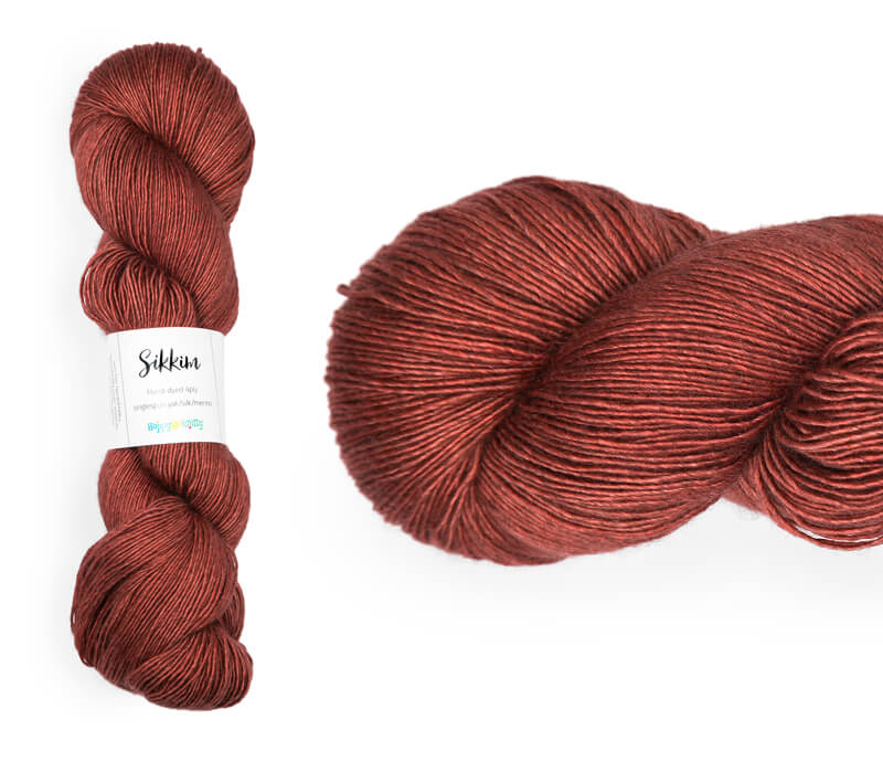 Hand-dyed single spun 15% yak / 20% silk / 65% superwash merino yarn. Colourway: Cayenne. 4ply. The yak fibre is clearly visible, giving it a slightly heathered look. Very soft and drapes beautifully, so suitable for shawls. It can of course also be used for scarves, hats, baby clothes, or other 4ply knitting.