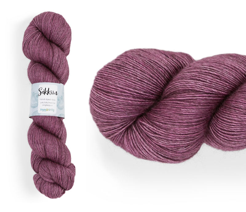 Hand-dyed single spun 15% yak / 20% silk / 65% superwash merino yarn. Colourway: Magnolia Tree. 4ply. The yak fibre is clearly visible, giving it a slightly heathered look. Very soft and drapes beautifully, so suitable for shawls. It can of course also be used for scarves, hats, baby clothes, or other 4ply knitting.