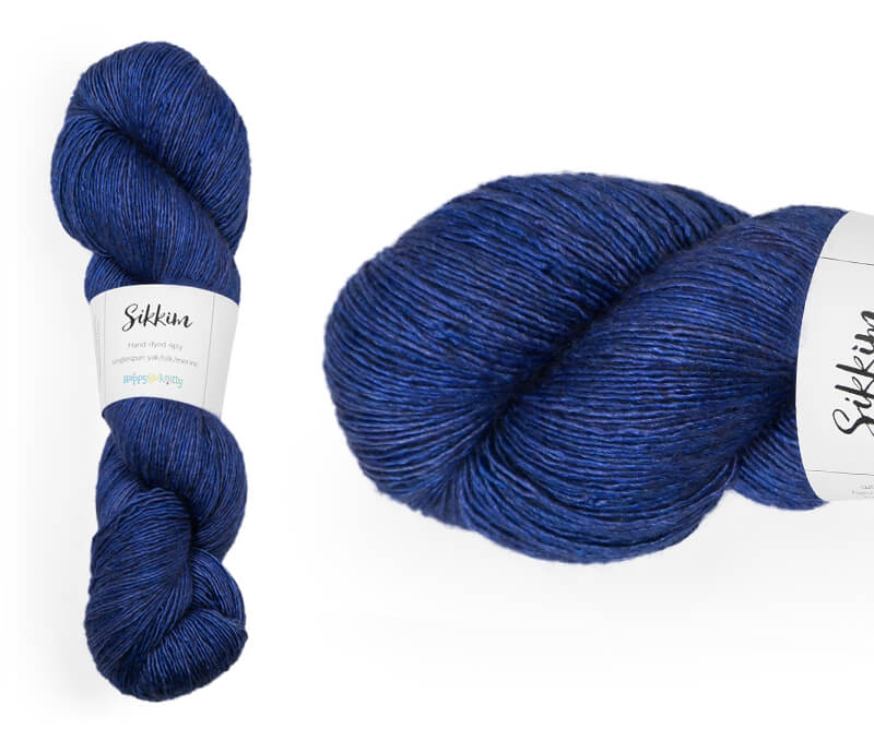 Hand-dyed single spun 15% yak / 20% silk / 65% superwash merino yarn. Colourway: Promise of Love. 4ply. The yak fibre is clearly visible, giving it a slightly heathered look. Very soft and drapes beautifully, so suitable for shawls. It can of course also be used for scarves, hats, baby clothes, or other 4ply knitting.
