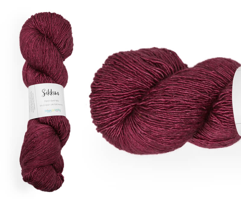 Hand-dyed single spun 15% yak / 20% silk / 65% superwash merino yarn. Colourway: Ripe Raspberries. 4ply. The yak fibre is clearly visible, giving it a slightly heathered look. Very soft and drapes beautifully, so suitable for shawls. It can of course also be used for scarves, hats, baby clothes, or other 4ply knitting.