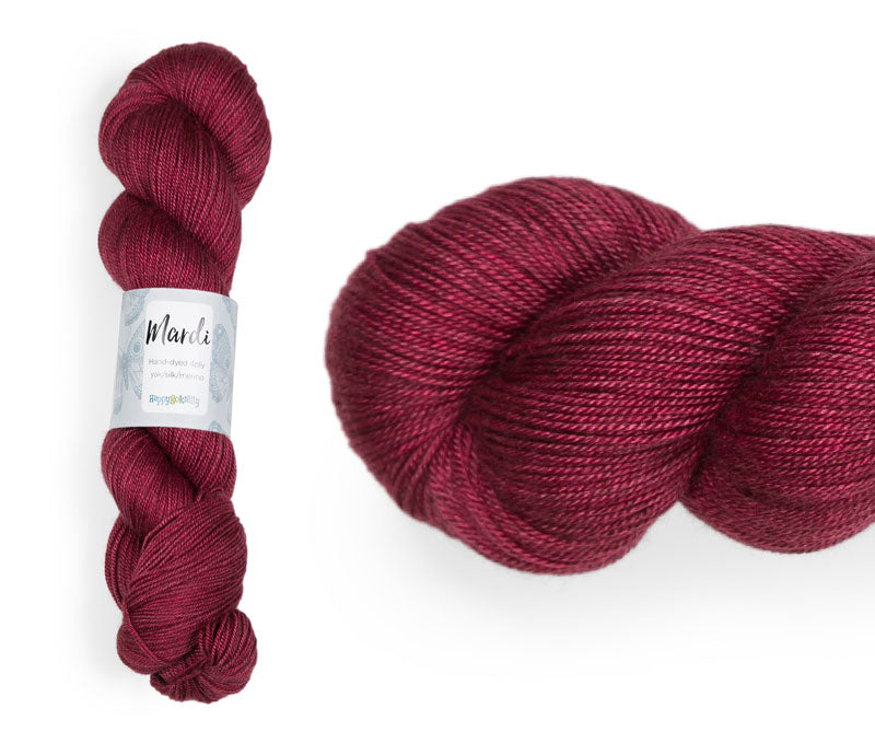 Hand-dyed, 20% yak / 20% silk / 60% superwash merino yarn. Colourway: Falu Red. 4ply, 100g skeins/approx 365m. A luxurious yarn spun from exotic fibres. This yarn is silky and drapey so it works very well for shawls but can also be used for that special garment. 