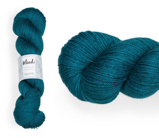 Hand-dyed, 20% yak / 20% silk / 60% superwash merino yarn. Colourway: Pacific Ocean. 4ply, 100g skeins/approx 365m. A luxurious yarn spun from exotic fibres. This yarn is silky and drapey so it works very well for shawls but can also be used for that special garment. 