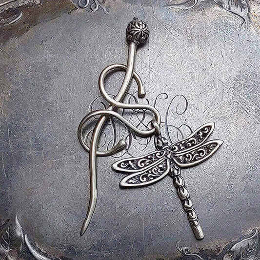Filigree Dragonfly Charm Lock Shawl Pin by JUL Designs in white brass. New shawl pin concept with a serpentine-shaped element that can accommodate a charm that can be slid on and off and then 'locked' in place with the stick. Pin may be worn on its own without a charm for a sleek elegant statement. Hand-made Fair Trade