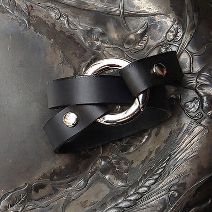 Bezel Leather Shawl Cuff by JUL Designs. Genuine leather available in black, espresso, pewter, and plum. Ring available in glossy nickel or satin finished antique brass. Length: approx 330 mm (13"), circumference when wrapped approx 165 mm( 6.5").
