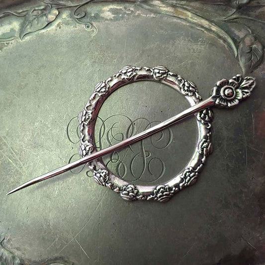 Camellia Garden Shawl Pin by JUL Designs in white brass. The floral motif in this shawl pin evokes the winter-blooming of Camellias. Hand-made Fair Trade in Indonesia.