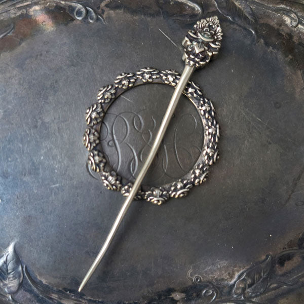 Throat Chakra Shawl Pin by JUL Designs in white brass. This design is intended to represent the Visuddha Chakra located at the throat. This chakra is associated with verbal expression, attentive listening, sense of purpose, and the ability to project one's creativity in the world.