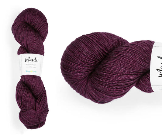 Hand-dyed, 20% yak / 20% silk / 60% superwash merino yarn. Colourway: Wine o'Clock. 4ply, 100g skeins/approx 365m. A luxurious yarn spun from exotic fibres. This yarn is silky and drapey so it works very well for shawls but can also be used for that special garment. 