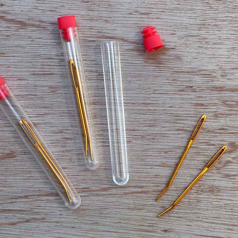 Bent darning needles