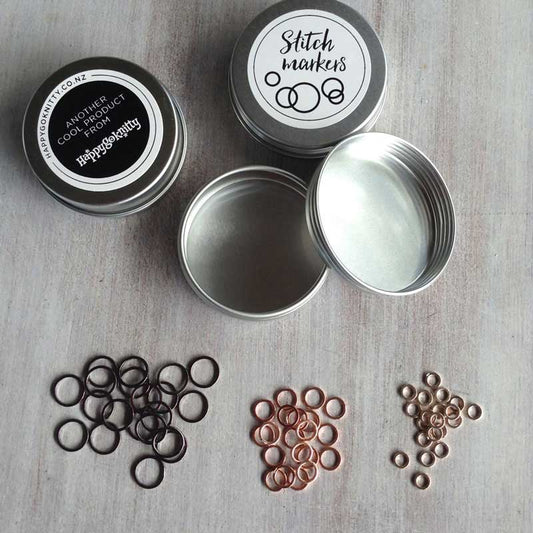 Closed metal stitch markers in three sizes and colours: Gun Metal (ID 8mm), Copper (ID 5mm), Rose Gold (ID 3mm). Supplied 20 of each size in a metal tin with a screw lid.