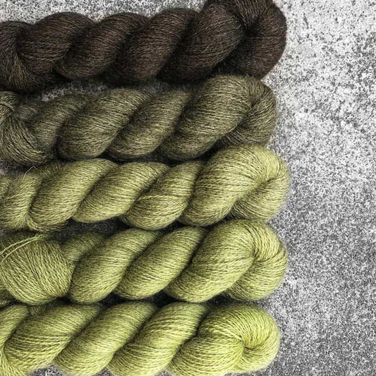 Hand-dyed, 50% Bluefaced Leicester / 50% Masham. Colourway: Green Olives. 4ply, 100g skeins/approx 450m. 5 x 100g, total 2,250m. Set of 5 skeins of natural coloured wool that has been dyed in the same colour. 