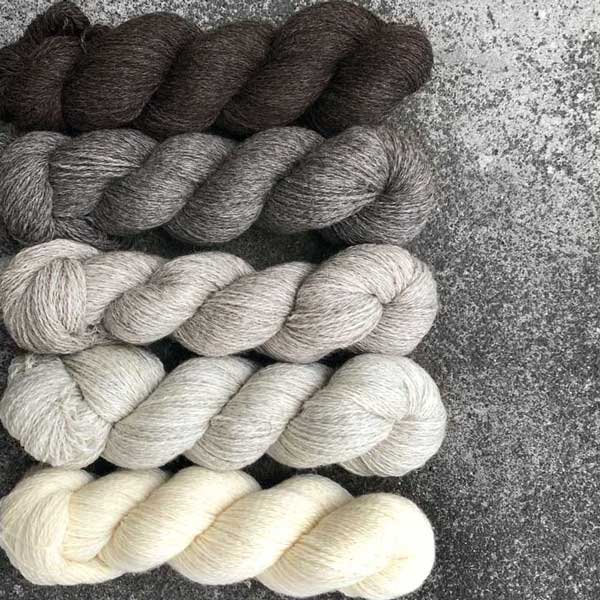 Hand-dyed, 50% Bluefaced Leicester / 50% Masham. Colourway: Natural. 4ply, 100g skeins/approx 450m. 5 x 100g, total 2,250m. Set of 5 skeins of natural coloured wool that has been dyed in the same colour. 