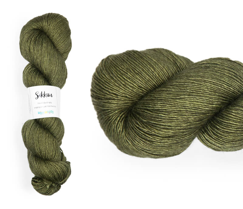Hand-dyed single spun 15% yak / 20% silk / 65% superwash merino yarn. Colourway: Green Olives. 4ply. The yak fibre is clearly visible, giving it a slightly heathered look. Very soft and drapes beautifully, so suitable for shawls. It can of course also be used for scarves, hats, baby clothes, or other 4ply knitting.