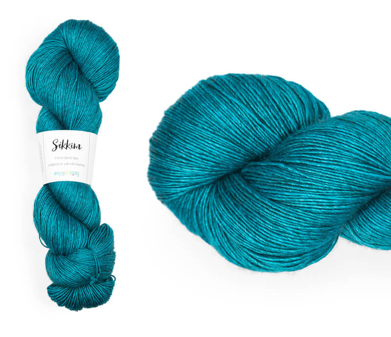 Hand-dyed single spun 15% yak / 20% silk / 65% superwash merino yarn. Colourway: Lagoon. 4ply. The yak fibre is clearly visible, giving it a slightly heathered look. Very soft and drapes beautifully, so suitable for shawls. It can of course also be used for scarves, hats, baby clothes, or other 4ply knitting.