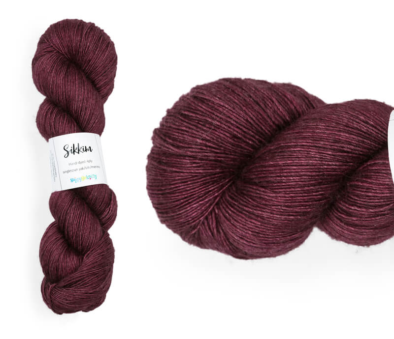 Hand-dyed single spun 15% yak / 20% silk / 65% superwash merino yarn. Colourway: Wine o'Clock. 4ply. The yak fibre is clearly visible, giving it a slightly heathered look. Very soft and drapes beautifully, so suitable for shawls. It can of course also be used for scarves, hats, baby clothes, or other 4ply knitting.