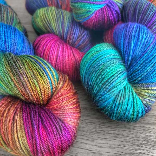 This yarn is hand-painted with 12 colours. Colourway: Artist's Palette. Available in Sikkim 4ply (singlespun 15% yak / 20% silk / 65% superwash merino), Mardi 4ply (20% yak / 20% silk / 60% superwash merino), Sinam 8ply (20% yak / 20% silk / 60% superwash merino), and Kashi 4ply (50% silk / 50% superwash merino). Close up shot.