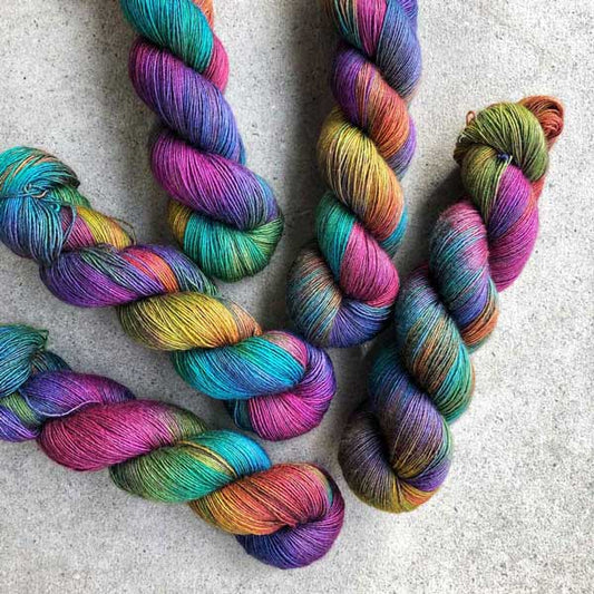 This yarn is hand-painted with 12 colours. Colourway: Artist's Palette. Available in Sikkim 4ply (singlespun 15% yak / 20% silk / 65% superwash merino), Mardi 4ply (20% yak / 20% silk / 60% superwash merino), Sinam 8ply (20% yak / 20% silk / 60% superwash merino), and Kashi 4ply (50% silk / 50% superwash merino).