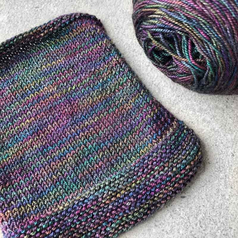 This yarn is hand painted with 12 colours. Colourway: Oil Slick. Available in Sikkim 4ply (singlespun 15% yak / 20% silk / 65% superwash merino), Mardi 4ply (20% yak / 20% silk / 60% superwash merino), Sinam 8ply (20% yak / 20% silk / 60% superwash merino), and Kashi 4ply (50% silk / 50% superwash merino).